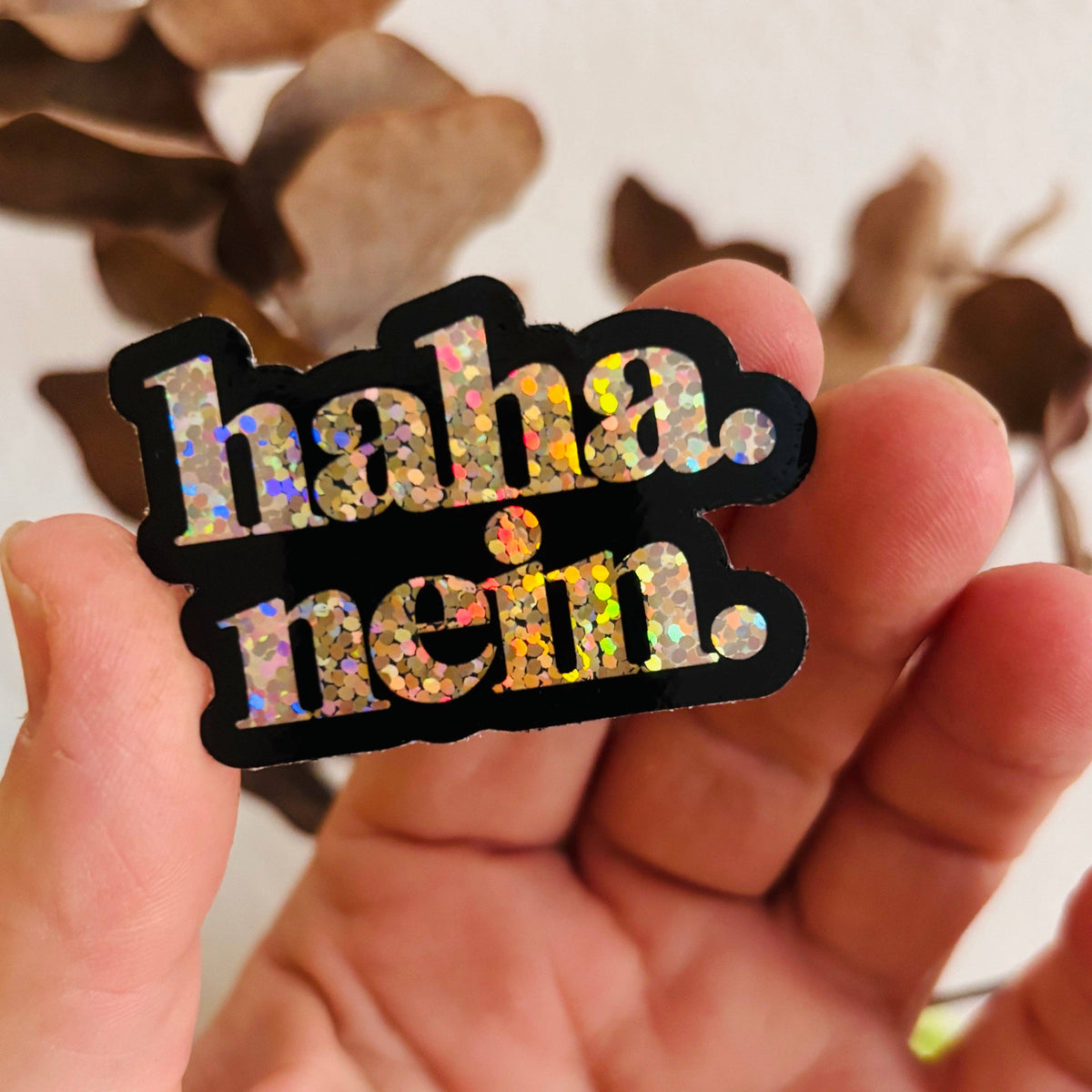 „haha. nein.“ Glitzersticker